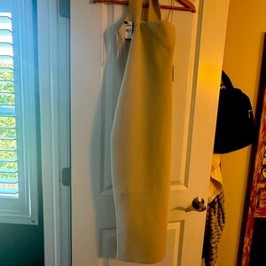 Light tan body contour one shoulder dress from Express. Never worn, with tags.